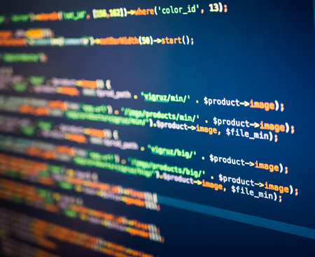Lines of php coding on the blue background, extreme close-up