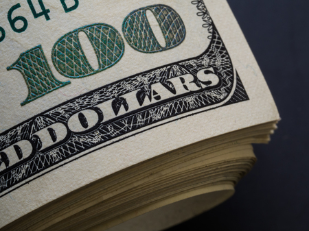 One hundred dollars corner of banknote with magnification, macroの写真素材