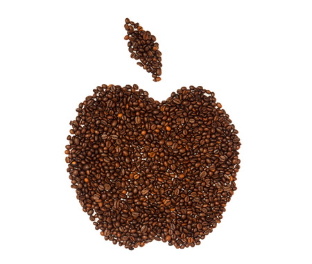 Coffee beans spread out in the form of apple on white background, isolated, top view