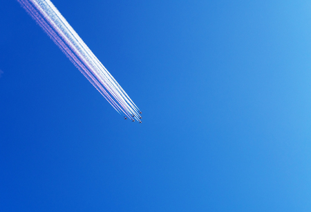 Airshow in Doha, Qatar. Airplanes on airshow. Aerobatic team performs flight at air showの写真素材