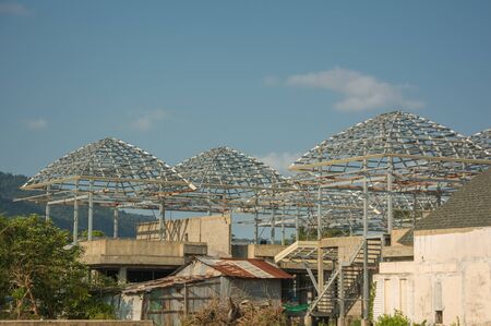 New hotel construction home metal framing of roof against a blue sky
