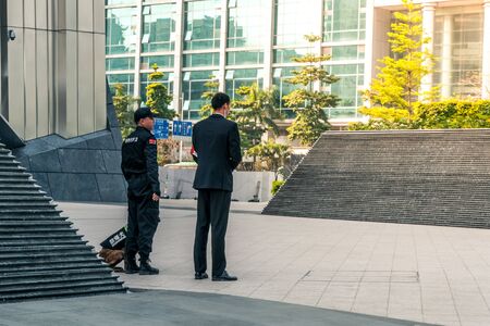 Police with explosion detection dog stationed in Shenzhen, China - April 2018