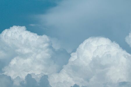 Blue sky with large cloud background.の写真素材