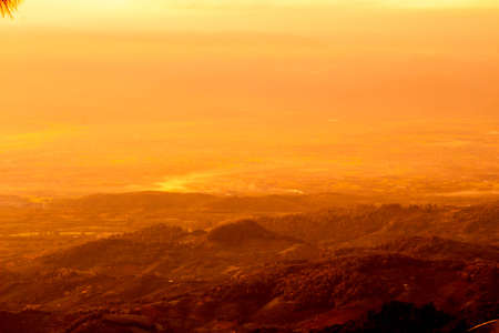 Beautiful landscape at sunset sky with clouds on peak of mountains.の写真素材