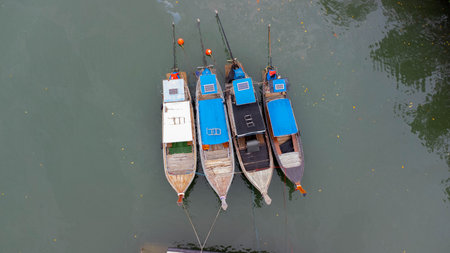 Aerial view of Thai traditional longtail fishing boats at the pier. Transportation and travel concept.の写真素材