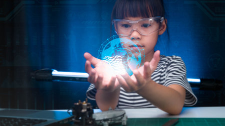 Child learning repairing getting lesson control toy drone in workshop, coding and solving engineering problem at home. Little Scientist School Project. STEM Education and Science technology concept.の写真素材