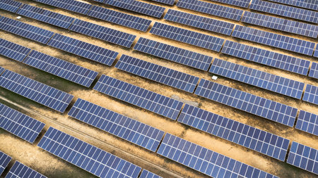 Top view on photovoltaic solar power panels. Drone aerial view of Solar panels system power...