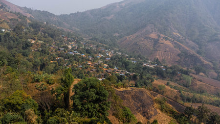A view from a drone of a rural mountain village in northern Thailand. village on the plateauの写真素材