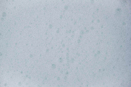 Texture of white soap foam with abstract soap bubbles background.の写真素材