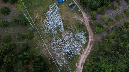Architectural metal structures of frame base connection with rivets and reinforced metal structures. Assemble and install Steel Tower for power transmission lines for sustainable power development.の写真素材