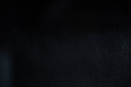 Water spray dust on dark background. Spraying mist effect isolated on black background.の写真素材