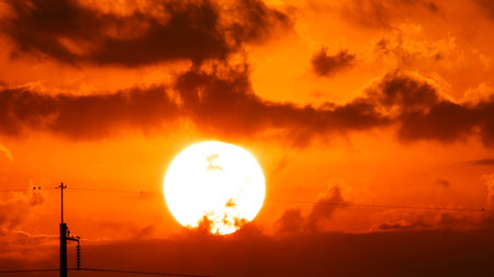 Beautiful nature morning with orange, yellow sunshine and fluffy clouds. Time lapse of a beautiful...