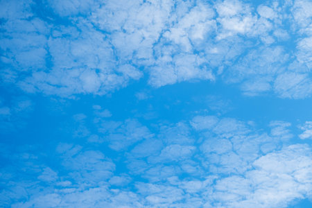 Beautiful sky with clouds and sun on a summer day. Time lapse of clouds above the blue sky with the...
