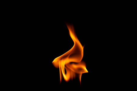 Hot flames on a black background. Beautiful flame of fire in the dark. Abstract of burning flames and smoke.の写真素材