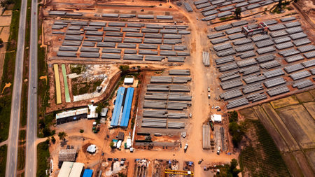 Aerial view of a cement bridge under construction. Road currently under construction at several levels to increase trafficの写真素材