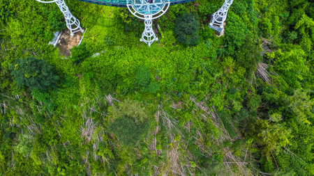 Aerial view of the Pra Yai Phu Khok Ngio or Chiang Khan Skywalk, Loei Province's newest landmark, overlooking the Hueang River flowing through to meet the Mekong River.の写真素材