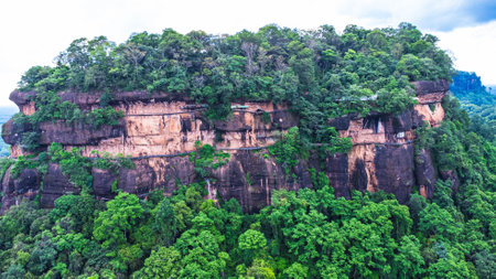 Phu Thok or Wat Chetiyakhiri ,Beautiful mountain landscape with rocky cliffs and wooden bridges on high cliffs, Bueng Kan Province, Thailand.の写真素材