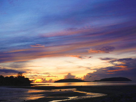 Beautiful morning view of sunrise at Pak Nam Sichon, the estuary area in Chumphon Province, Thailand.の写真素材