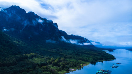 Beautiful view of mountains with fog in Kanchanaburi, Thailandの写真素材