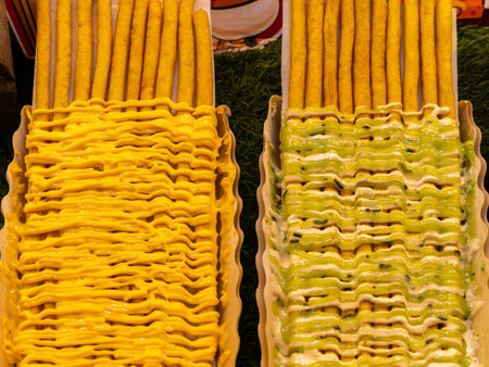 Rainbow cheese long french fries or cheese chips are a food made from French fries covered in...
