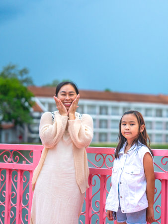 Happy mother and daughter spending time together during spring.の写真素材
