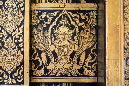 Ancient Thai mural painting in thai churchの写真素材