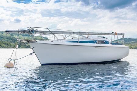 Yacht on the lake with blue sky.