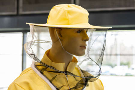 Beekeeping suit. Protection against bees and insects. Cap with net.