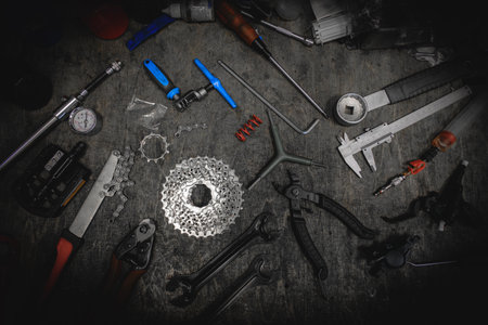 Bicycle repair workshop. Top view of table with tools for servicing bicycles.の写真素材