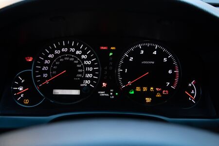 instrument cluster indicators on an SUV control panel, close-up