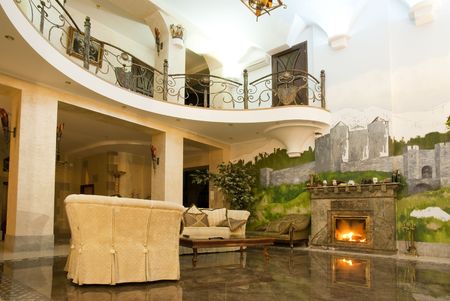 Photos of modern living room with a fireplace in a luxurious villaの写真素材