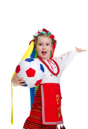 Euro 2012 fan - Little girl in traditional ukrainian clothes with ballの写真素材