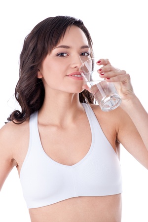 Beautiful healthy fitness girl drinking clean water の写真素材