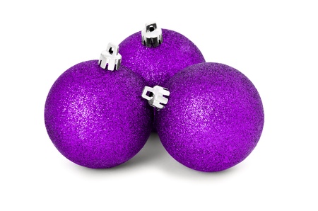 Three pink baubles for christmas firtree on white backgroundの写真素材