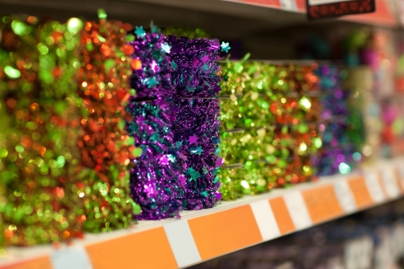 Line of different xmas decor on shelfs in hypermarketの写真素材