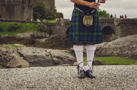 Bagpiper's legs at traditional dress in Edinburgh, Scotlandの写真素材