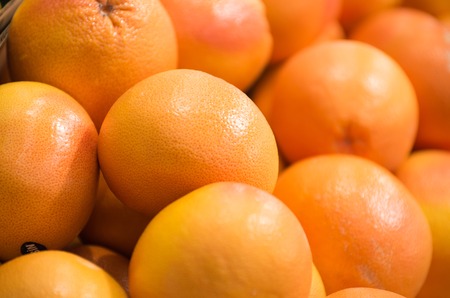 Background from a fresh fruits on the shelf in the supermarketの写真素材