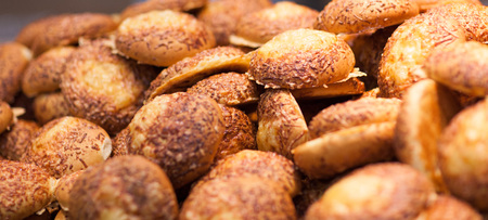 Loaf bread. Many loaves of bread. Background. Loaf bread on supermarket stallの写真素材