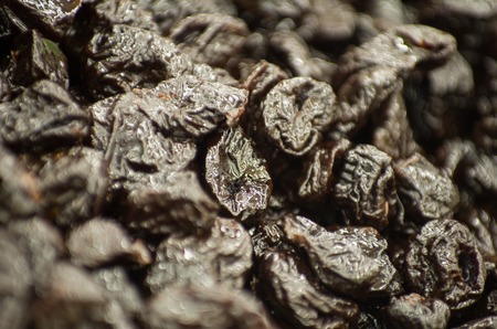 Date fruit closeup background. Date fruits on food store shelf on fruit marketの写真素材