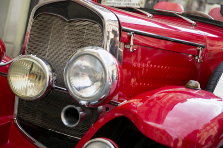 Closeup Detail of the vintage retro car on the city streetの写真素材