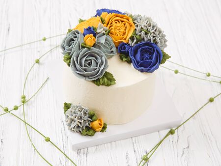 Naked wedding birthday cake. Rustic layer homemade cake with cream. Dessert decorated with roses...