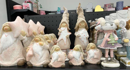 Kryvyi Rih, Kryvyi Rih / Ukraine-August 22, 2020: Dwarves and elves on the shelf. Ceramic figurines on the store shelf. Toys for Christmas and New Year.のeditorial素材