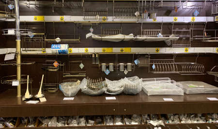 Kryvyi Rih, Kryvyi Rih / Ukraine-August 22, 2020: Metal tableware stands. Shop with tableware accessories. Shelves with goods in the supermarket.のeditorial素材