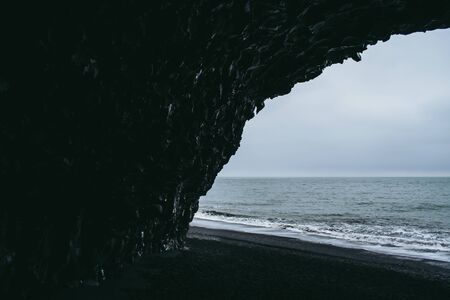 The view from the cave on Reynisfjara beach in Icelandの写真素材