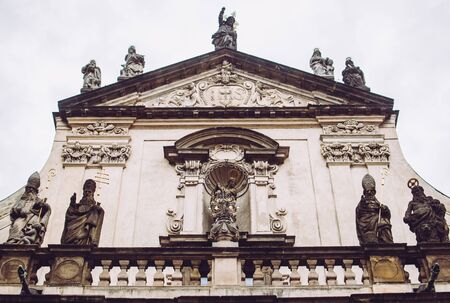 Dark facades of St. Salvator Church at Charles Bridge in Pragueの写真素材