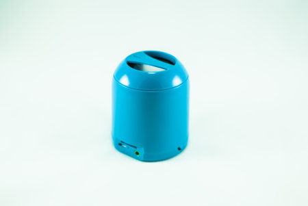 Blue mini portable speaker on a white backrground. Isolatedの写真素材