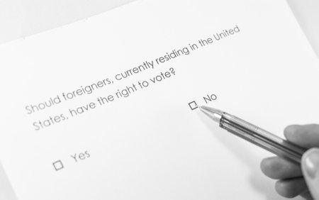 Should foreigners, currently residing in the United States, have the right to vote? Noの写真素材