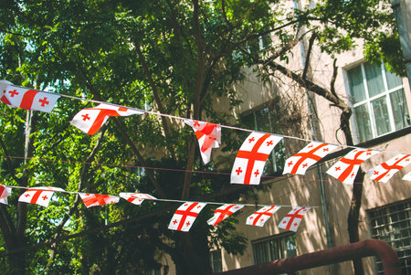 Georgian flags hanging over the streets of Tbilisi, Georgia.