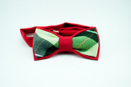 Stylish and well-designed red-green bow-tie on a white background; isolatedの写真素材