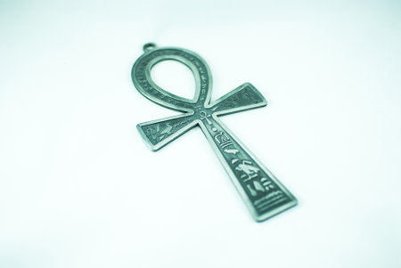 Silver Egyptian ankh on the white background, isolatedの写真素材